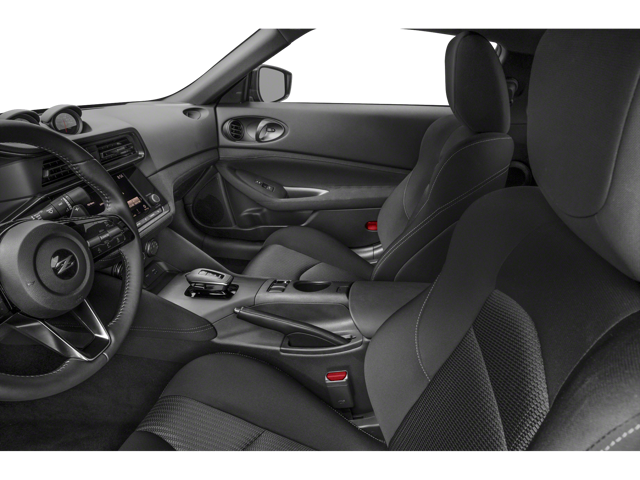 Interior shot of a car, showing the gray driver's and passenger's seats