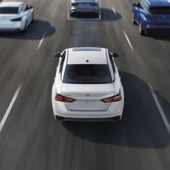 2027 Nissan Altima on freeway surrounded by cars with schematic drawings of ProPILOT Assist capabilities at HGreg Nissan Kendall in Palmetto Bay FL