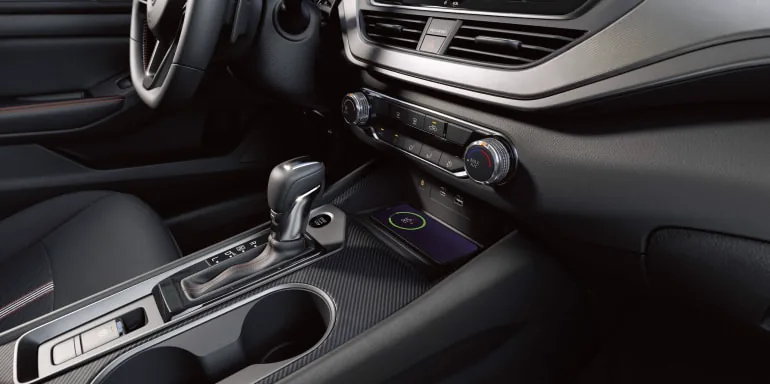 Close up on a phone wirelessly charging in the 2027 Nissan Altima sedan at HGreg Nissan Kendall in Palmetto Bay FL