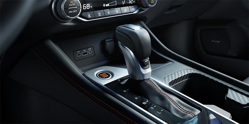 Car interior showing the center console with an automatic gear shift