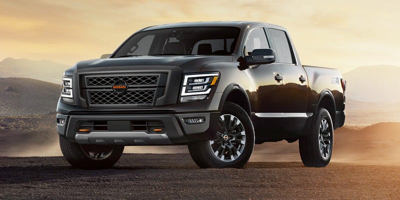 A dark gray Nissan Titan pickup truck, angled slightly right